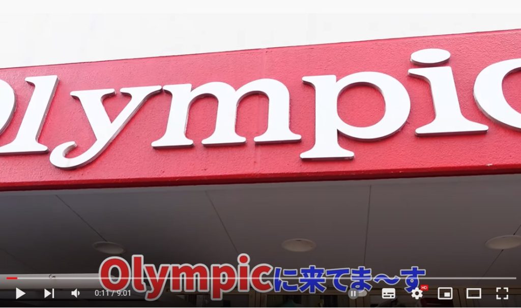 店舗せどりをするOlympicというディスカウントショップを紹介している場面